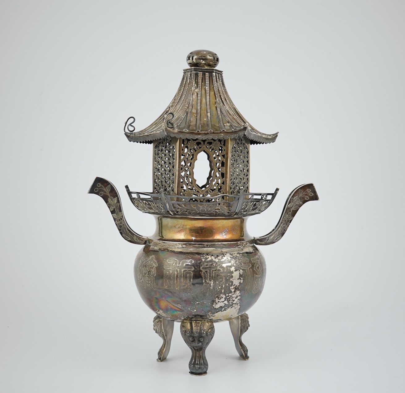 An unusual Chinese silver tripod censer with pagoda shaped cover, ding, early 20th century